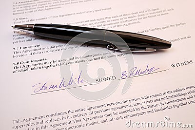 Pen lying on a legal contract