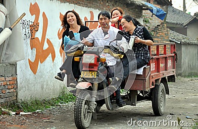 Pengzhou, China: Family on a Motorbike Truck