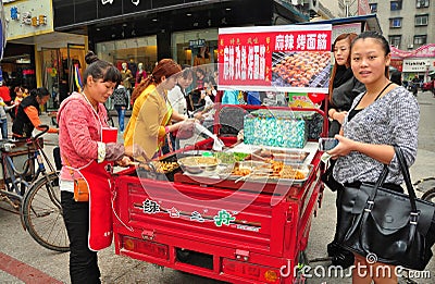 Pengzhou, China: People Buying Street Food