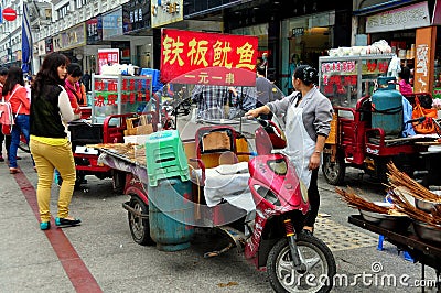 Pengzhou, China: Street Vendors Selling Food