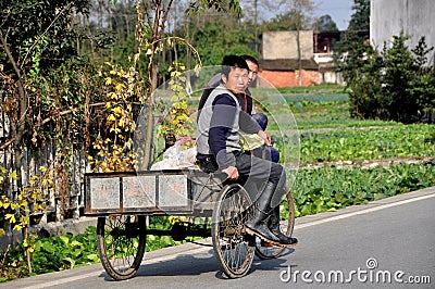 Pengzhou, China: Two Men in Bicycle Cart