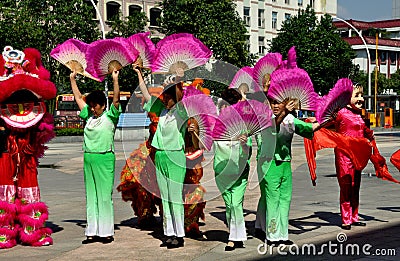 Pengzhou, China: Women Dancing with Fans