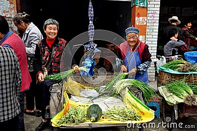 Pengzhou, China: Women Selling Produce