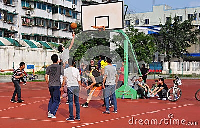 Pengzhou,China: Youths Playing Basketball