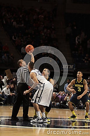 Penn State playersPenn State s Ross Travis and Michigan s Jordan Morgan jump for the basketball to start a game