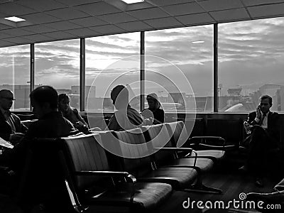 People at airport waiting for fllight, vertical