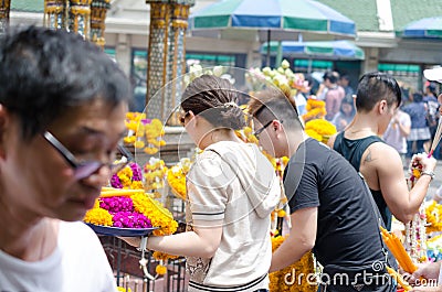 People around Hindu god shrine