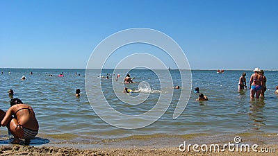 People bathe in the sea