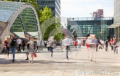 People blur. Office people moving fast to get to work at early morning in Canary Wharf aria