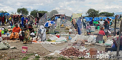 People buying products on the market on march in africa