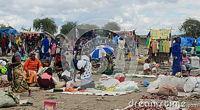 People buying products on the market on march in africa