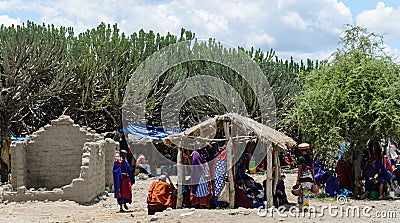 People buying products on the market on march in africa