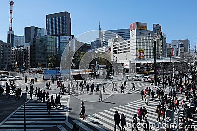 People cross a street in Japan