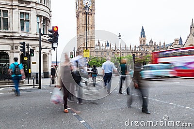 People crossing a street in Westminster, London