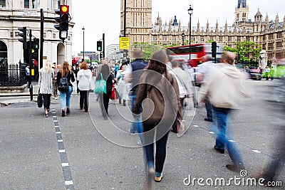 People crossing a street in Westminster, London