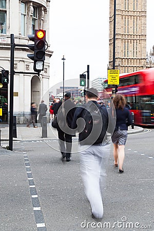 People crossing a street in Westminster, London