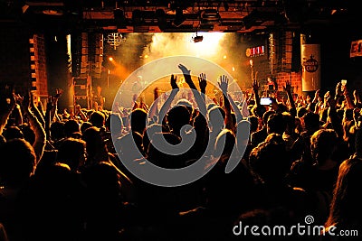 People from the crowd (fans) applauding a concert by Bombay Bicycle Club (band) at Bikini Club