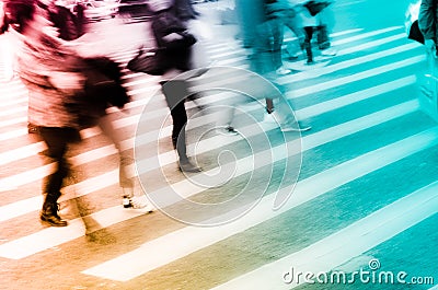 People crowd on zebra crossing street