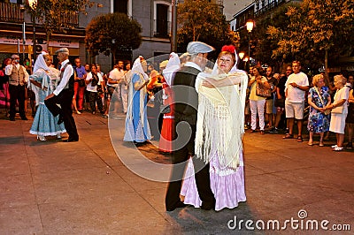 People dancing the chotis dance in Madrid, Spain