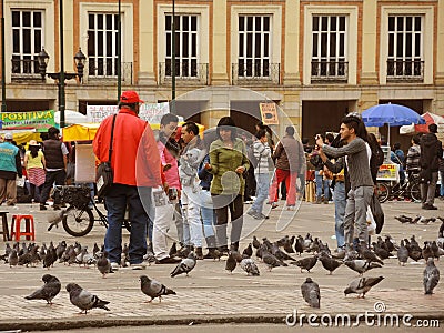 People and doves in the Bolivar Square