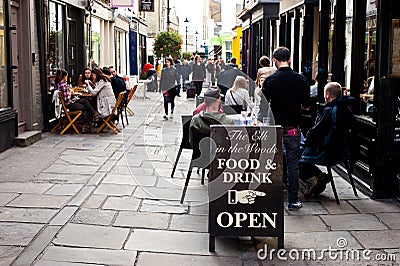 People enjoy outdoor dining in London