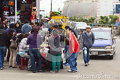 People at Foodstand in Downtown Lima, Peru