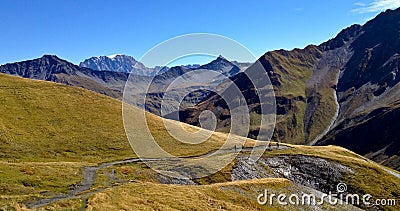 People hiking on the alps