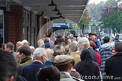 People Line Up for a Political Rally