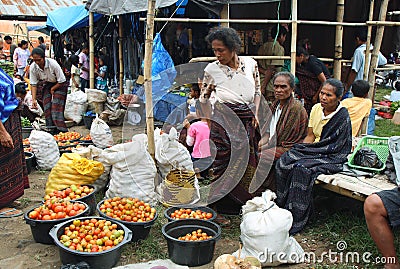 People of minoritary ethnic group in a market of Indonesia