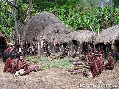 People of Papuan tribal sell traditional souvenirs