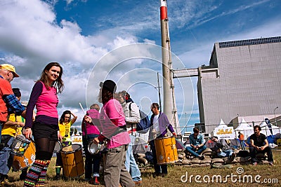 People play music on the festival against the Nuclear Power Plant