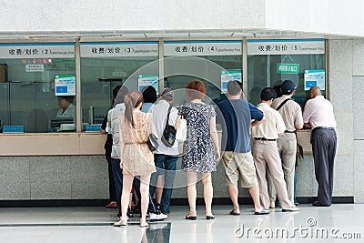 People in the queue at the windows of the hospital