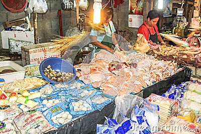 People selling food at traditional market, thailandia