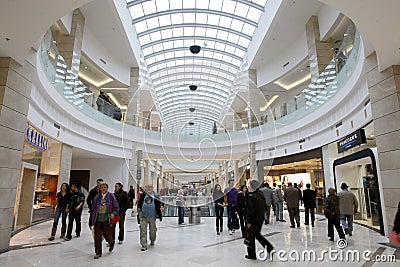 People shopping in busy mall