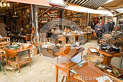 People shopping at the flea market of Clignancourt at Paris