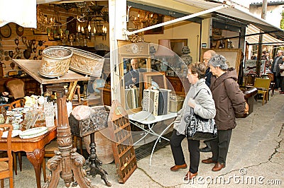 People shopping at the flea market of Clignancourt at Paris