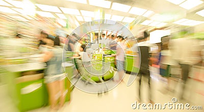 People shopping in the supermarket, the fuzzy movement