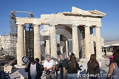 People sightseeing Temple of Athena Nike in Athens