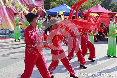 People sing and dance to celebrate the chinese new year