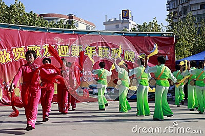 People sing and dance to celebrate the chinese new year