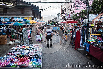 People stroll at a market