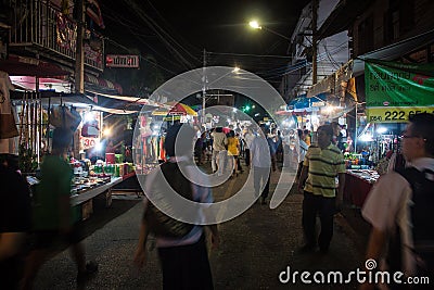 People stroll at a market