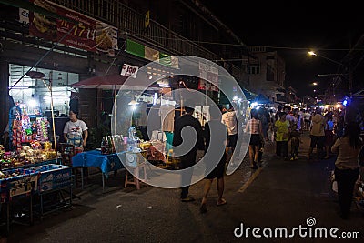 People stroll at a market