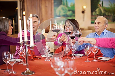 People Toasting Wine Glasses At Restaurant