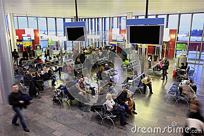 People in waiting room at the airport