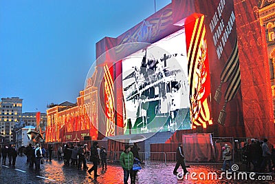 People walk on the Red Square in Moscow. GUM building.