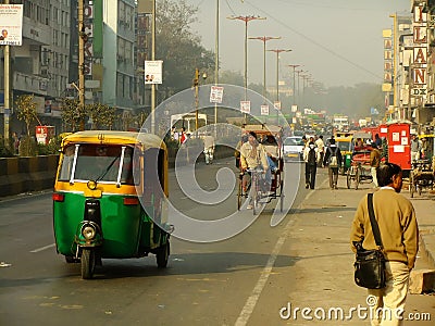 People walking on busy street of Delhi, India