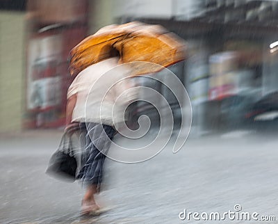 People walking down the street in rainy day