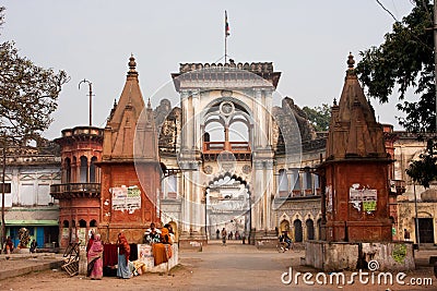 People walking near the beautiful gates of indian city Ayodhya