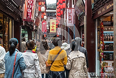 People walking in street of Fang Bang Zhong Lu old city shanghai